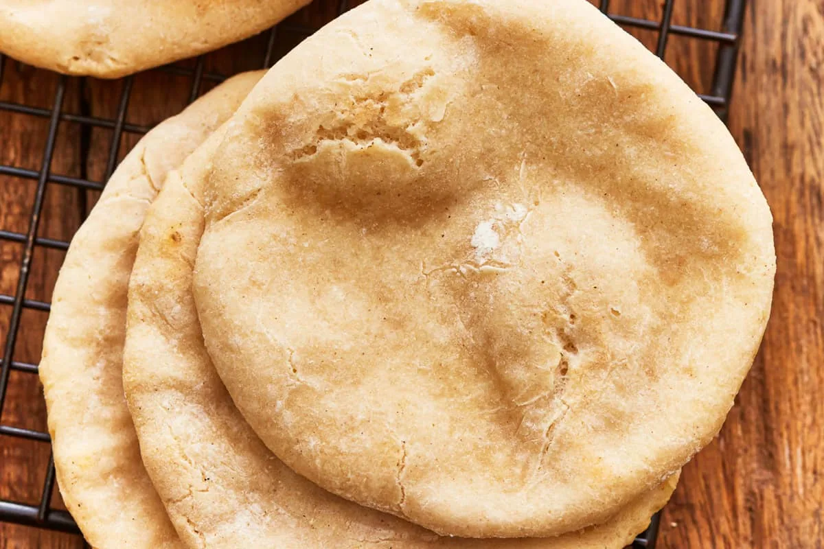 Close-up of the tender, airy crumb of a gluten-free pita bread